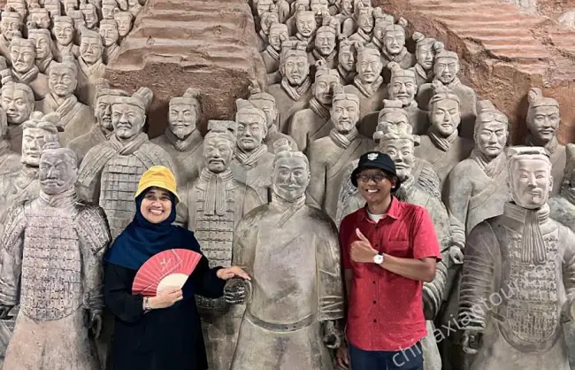 clients-visit-terracotta-warriors-xian-china - China Xian Tour: Private & Tailor-Made China Tours The Terracotta Warriors are as tall as a real person