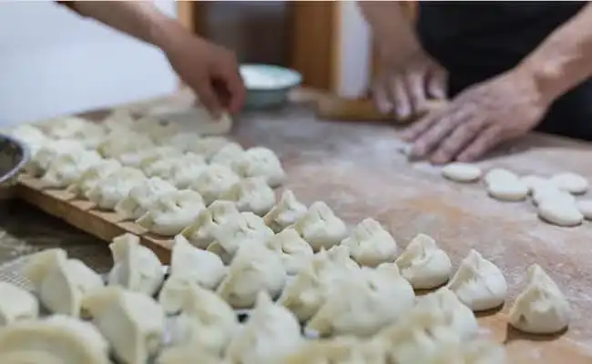 Make dumpling in Beijing hutong