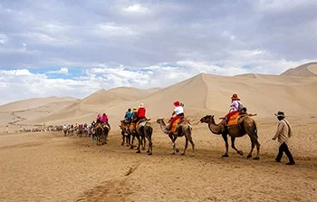 Camel Ride at Echo Sand Mountain in Dunhuang